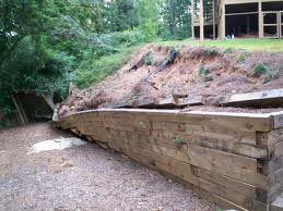 Retaining Walls that are leaning away from the foundation as earth shifts the foundation