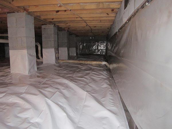 A crawl space that is being properly insulated